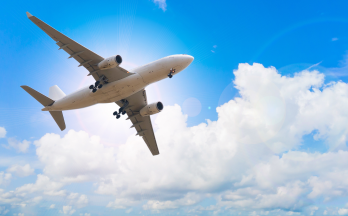 Large plan flying in blue skies Large plan flying in blue skies