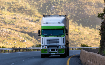Transport truck driving on highway Transport truck driving on highway
