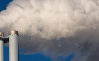 greenhouse gas Factory exhaust pipes in sky with smoke