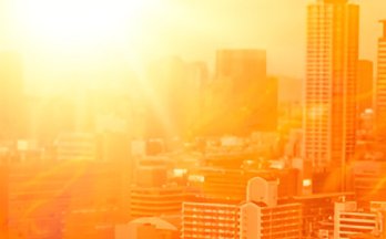 City skyline engulfed in flames and intense heat. City skyline engulfed in flames and intense heat.