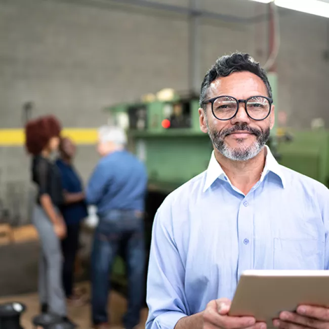 Man holding ipad