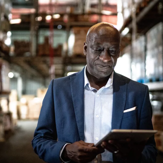 Businessman holding a digital tablet 