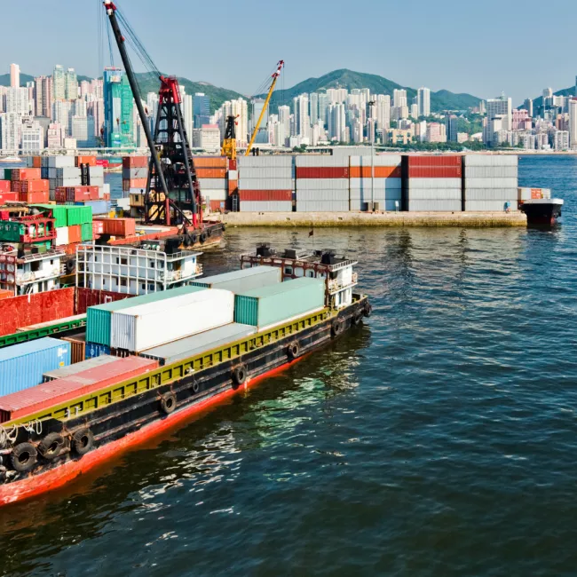 Boats loading shipping containers