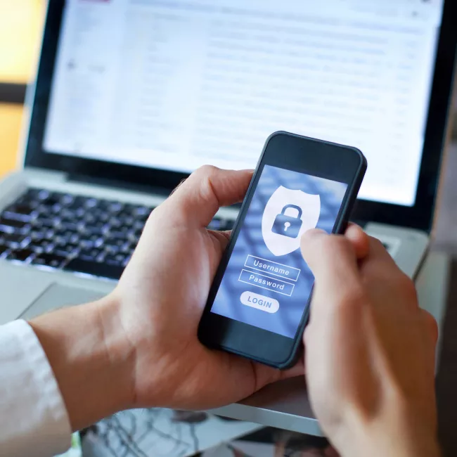 Close-up on smartphone with a lock symbol and login fields
