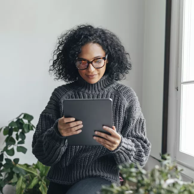 Young woman looking at a digital tablet