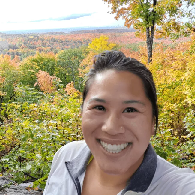 Gillian Koh in a forest