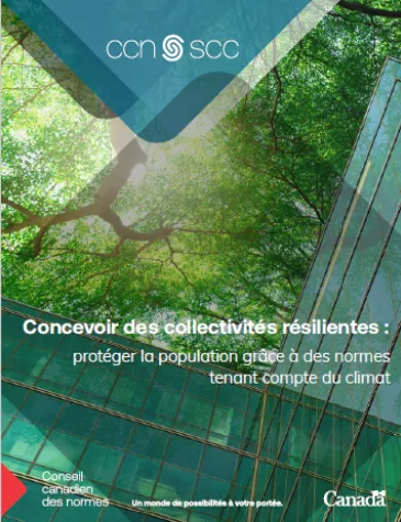 Environmental concept with glass building and green leafy trees above