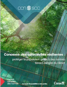 Environmental concept with glass building and green leafy trees above