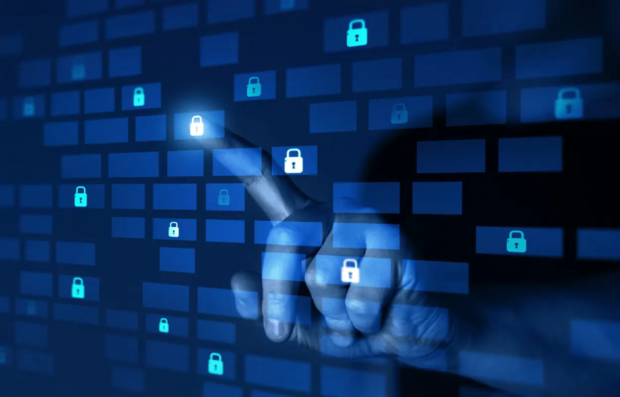 Hand pointing at digital padlocks on a blue virtual interface.