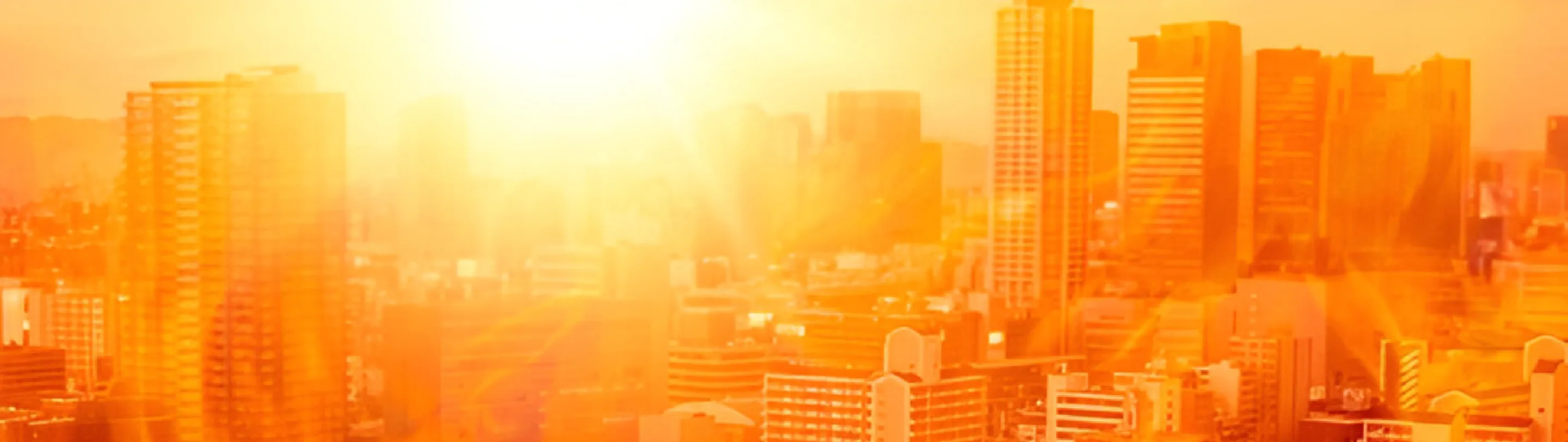 City skyline engulfed in flames and intense heat.